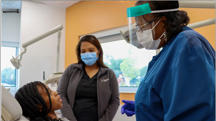 Student with red glasses